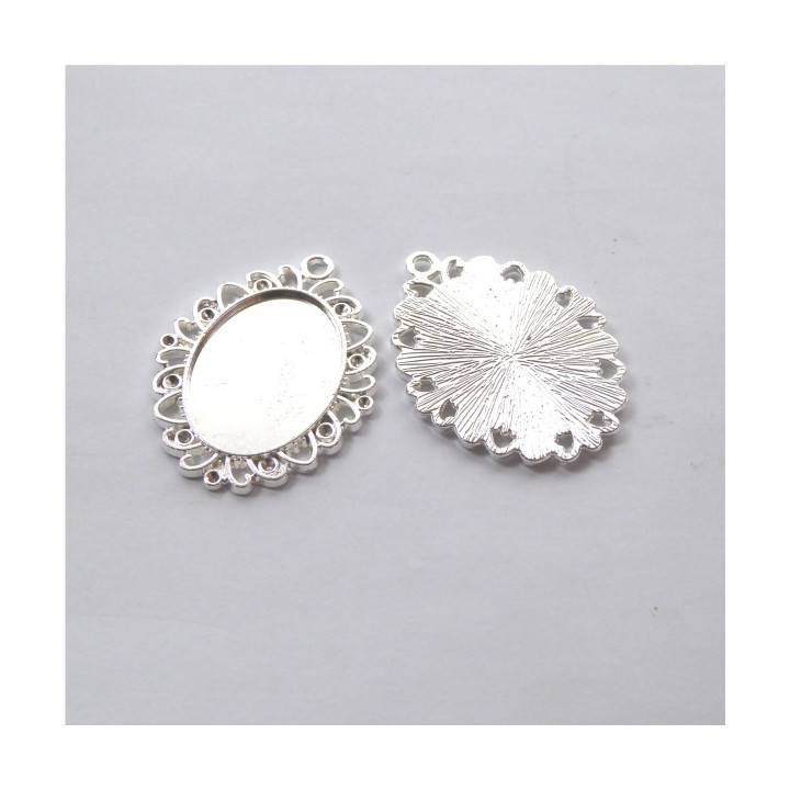 MEDAGLIA IN ZAMA ARGENTATA 29x38x2mm - interno 18x25