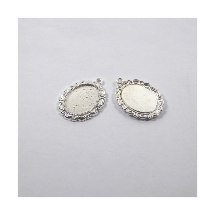 MEDAGLIA IN ZAMA ARGENTATA 20x28x2mm - interno 10x14