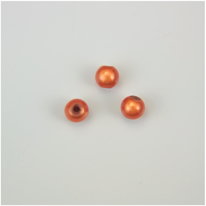 GRANO IN PLASTICA ARANCIONE BRILLANTE Ø 6 mm. Confezione da 0,5 KG.