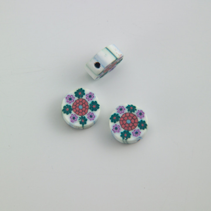 GRANO IN FIMO FORMA TONDA BIANCA CON FIORI 10x5 mm. Confezione da 1000 PZ.