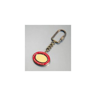 PORTACHIAVI GIREVOLE OVALE BORDO ROSSO CON INTERO DORATO
